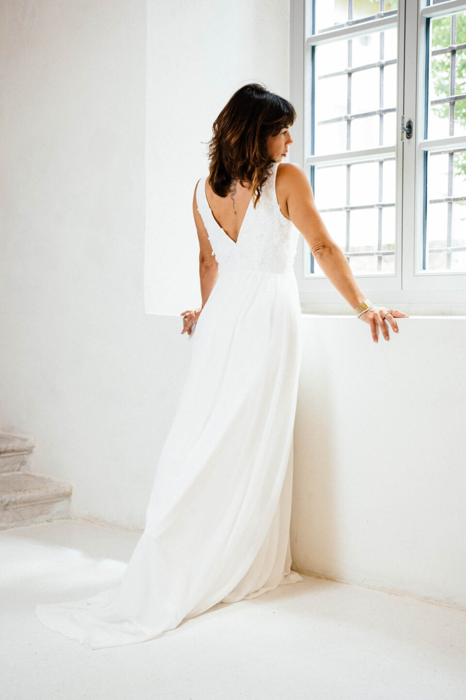 V-Rücken und Chiffonrock mit Schleppe beim Brautkleid Bibbona